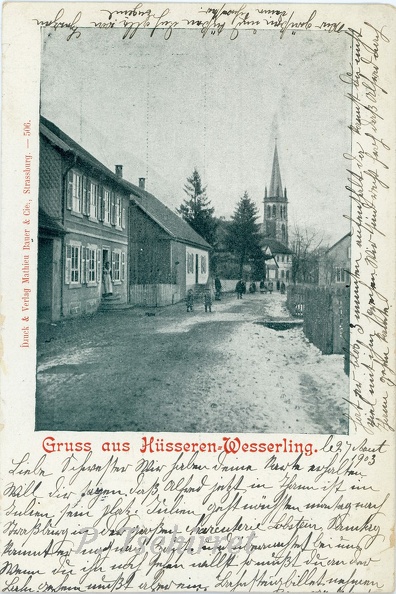 Husseren-Wesserling-Eglise-vue-de-la-grand-rue-1903-r.jpg